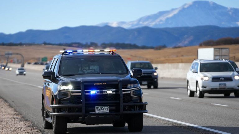 emergency vehicle driving down interstate