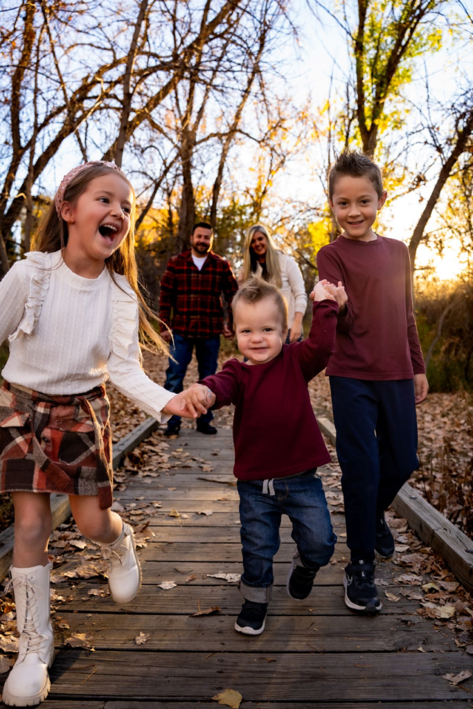 kids taking a family photo
